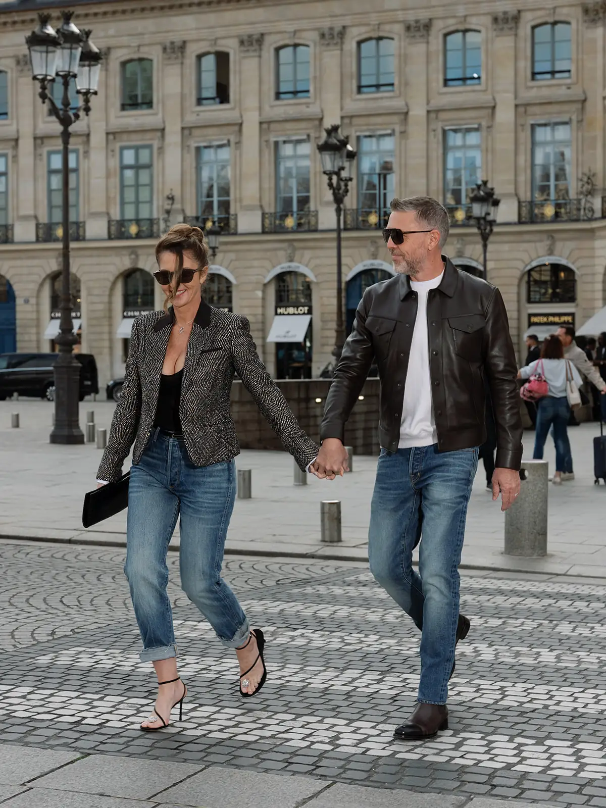 Members of the Tom Ford team wearing denim and jackets on Place Vendôme