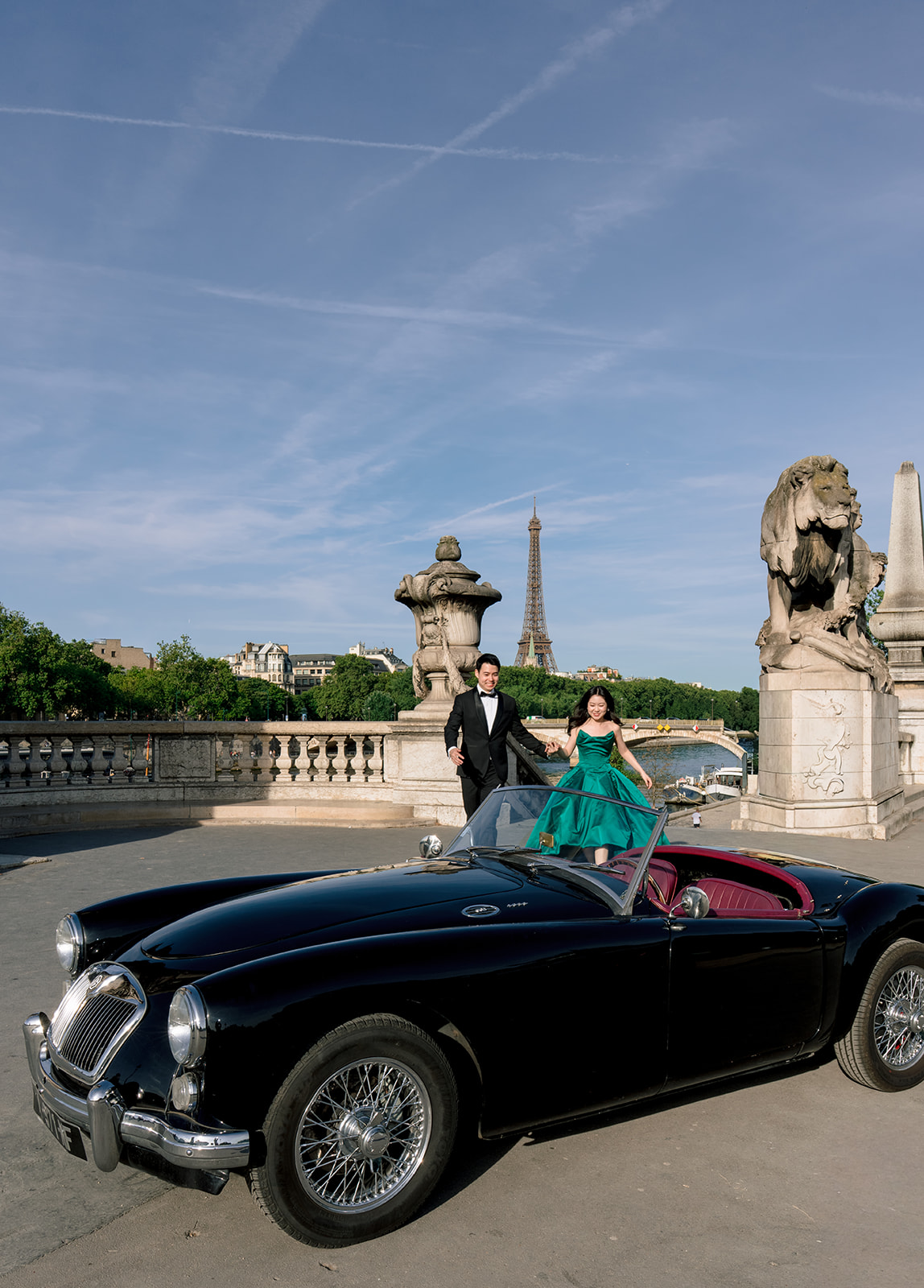 Vintage MG roadster photographed in Paris with the Eiffel Tower during a pre-wedding session