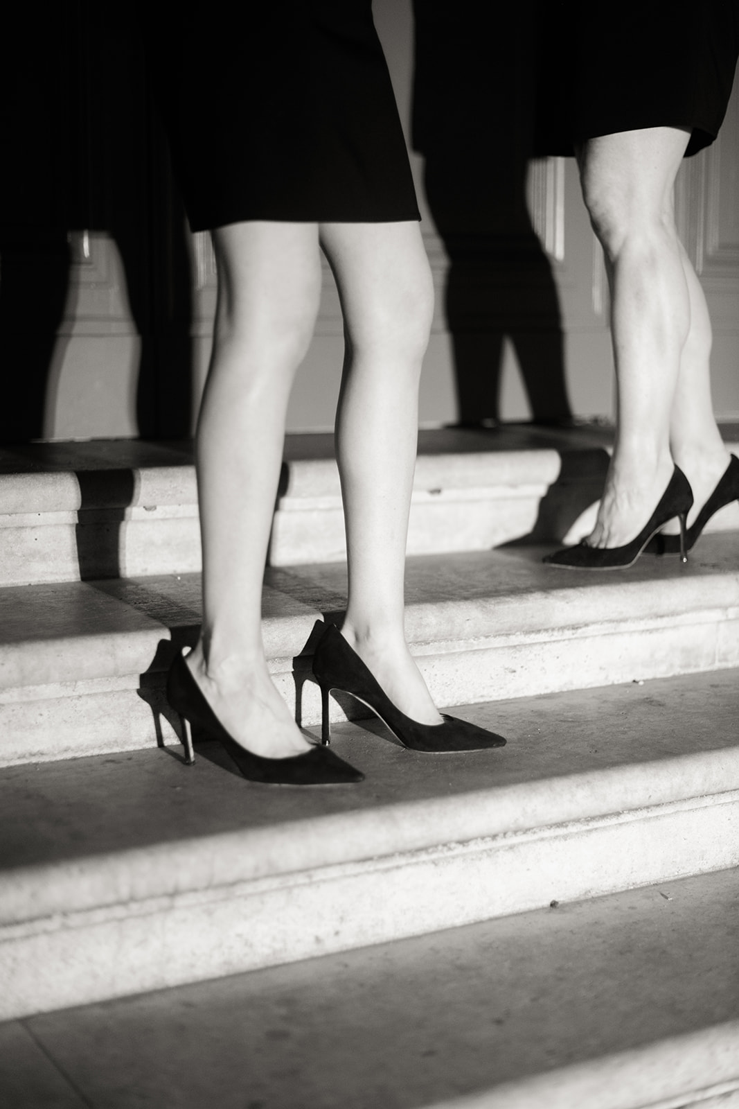 Black heels and graphic shadows during an editorial Paris elopement