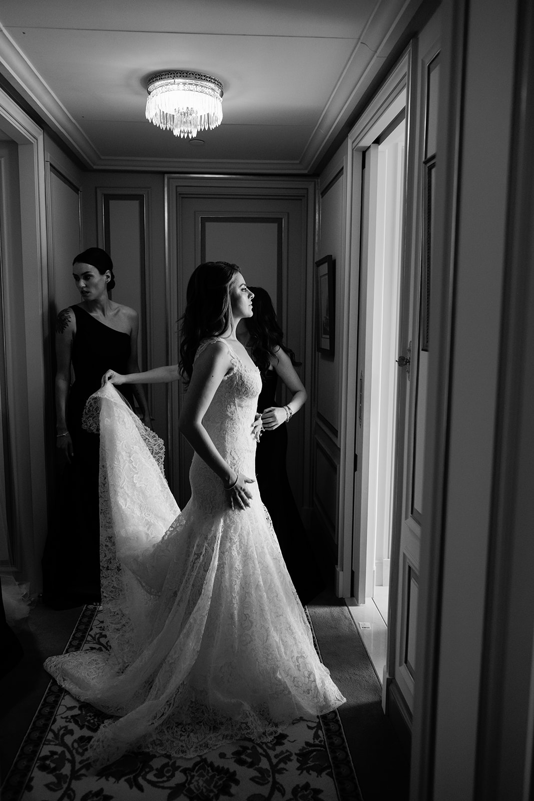 Candid bridal moment while getting dressed at the Ritz Paris