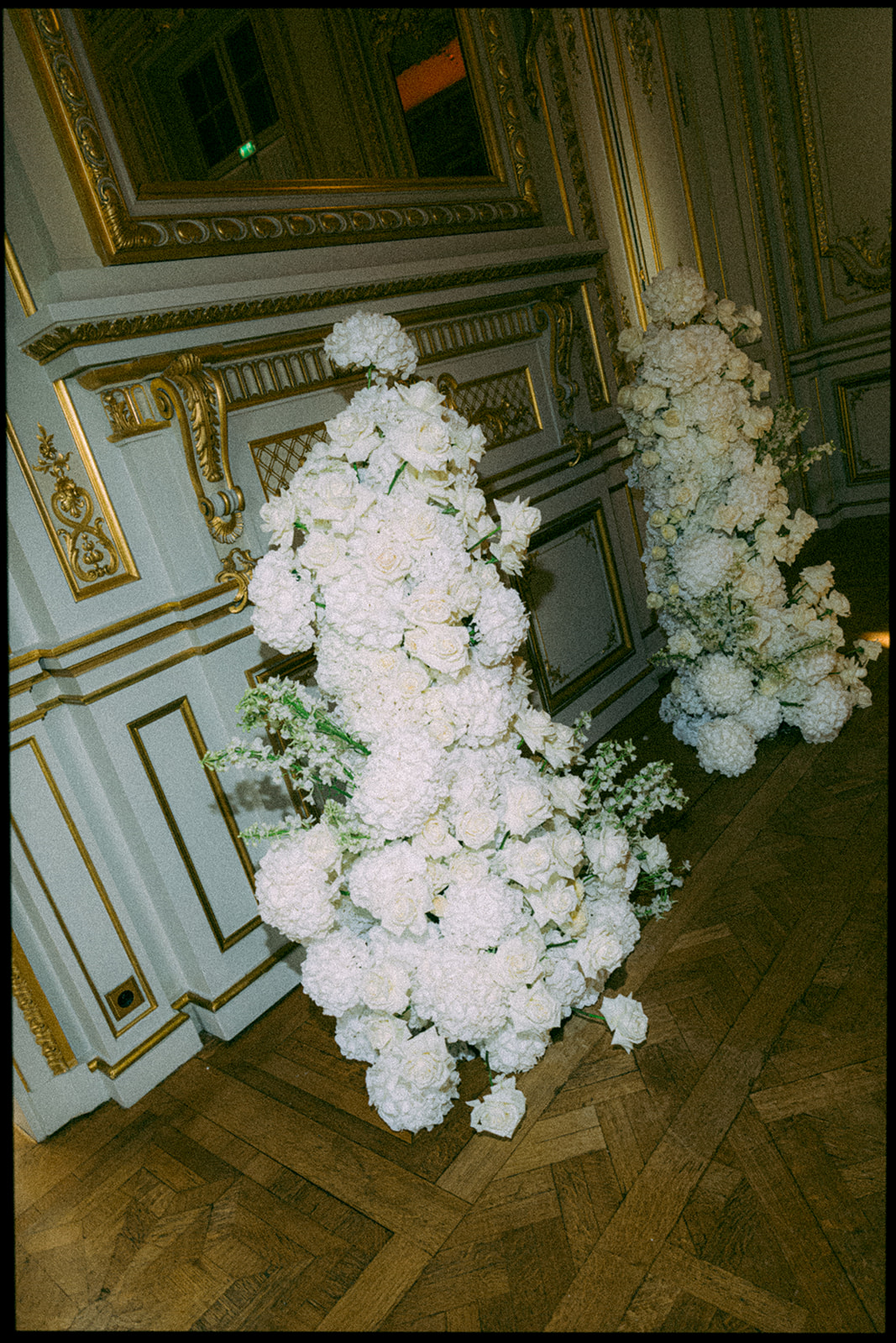 Red floral design for an editorial luxury wedding reception in Paris