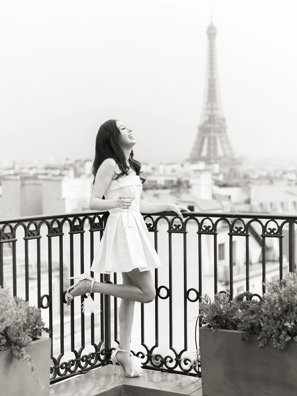 Bride on The Peninsula Paris rooftop with an Eiffel Tower view