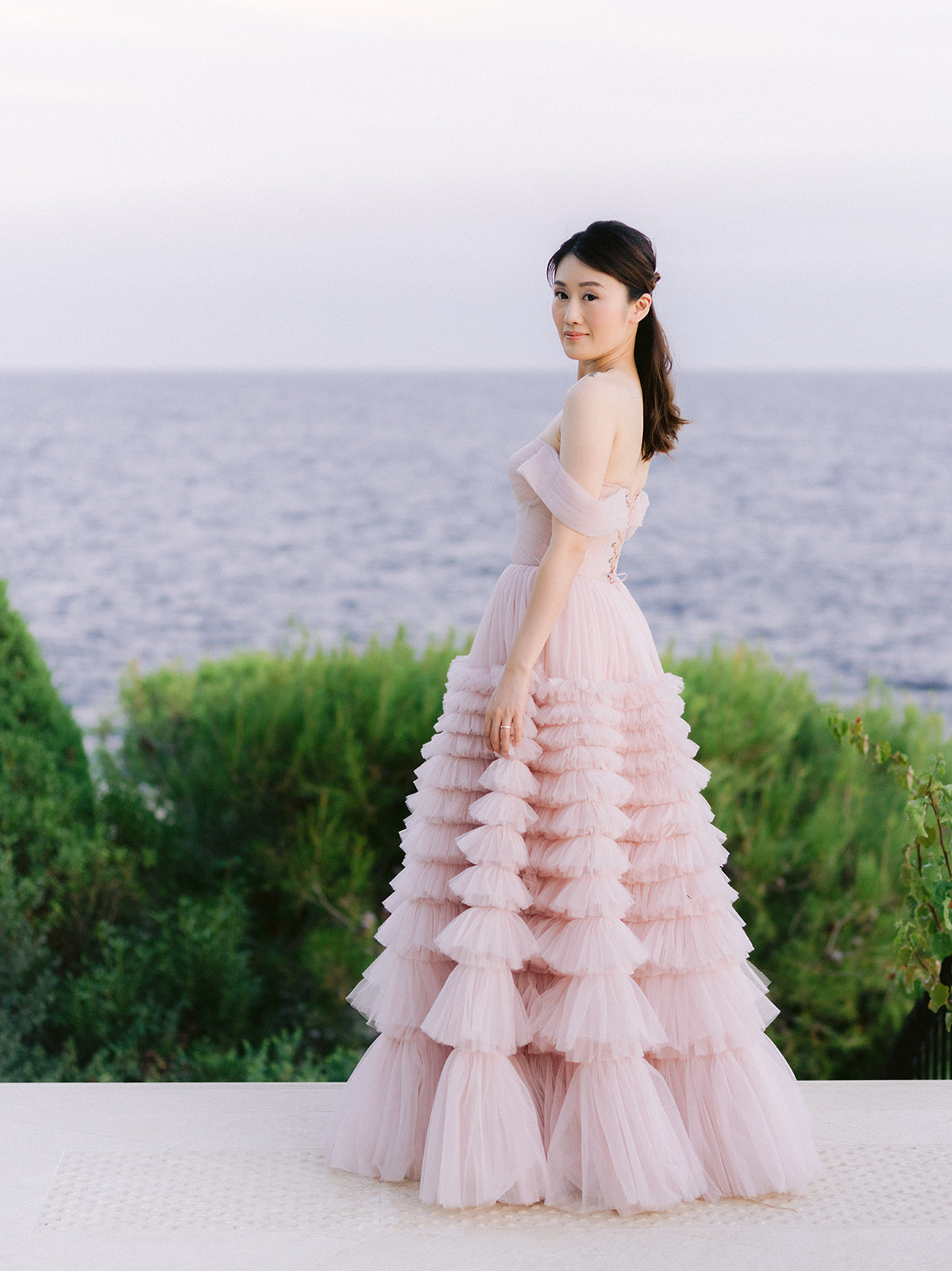 Editorial portrait in a pink gown overlooking the Mediterranean at Grand-Hôtel du Cap-Ferrat