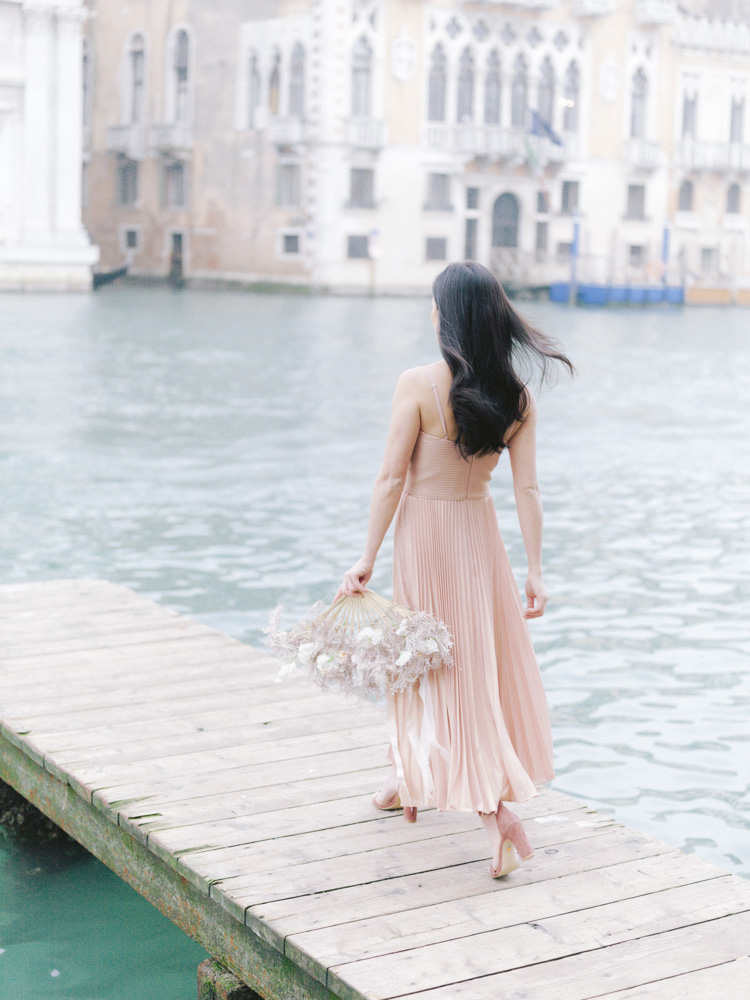 a woman walk in venice