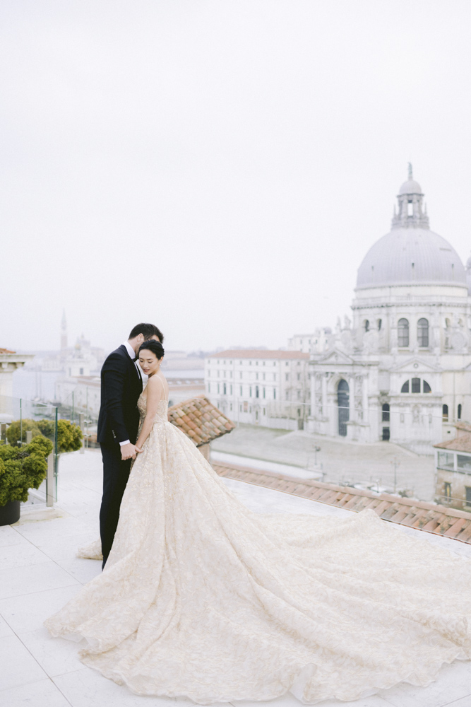  a couple on the roofs of the gritti palace in venice