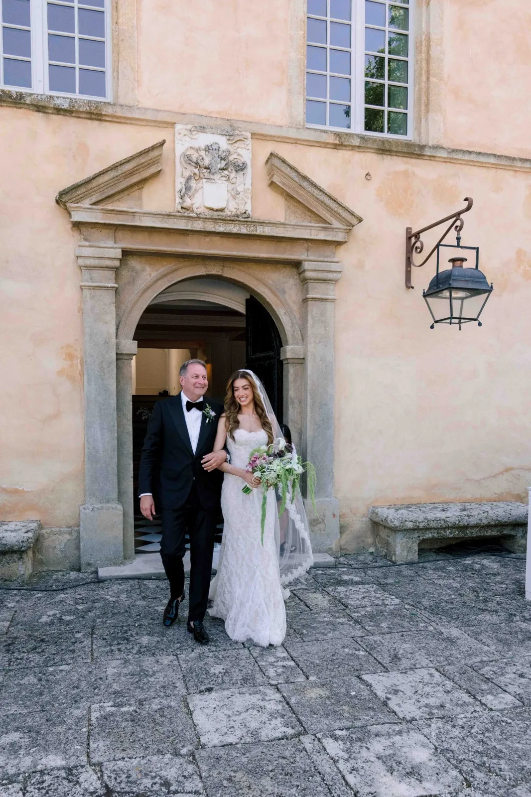 Bride walking down the aisle during an outdoor Provence wedding ceremony