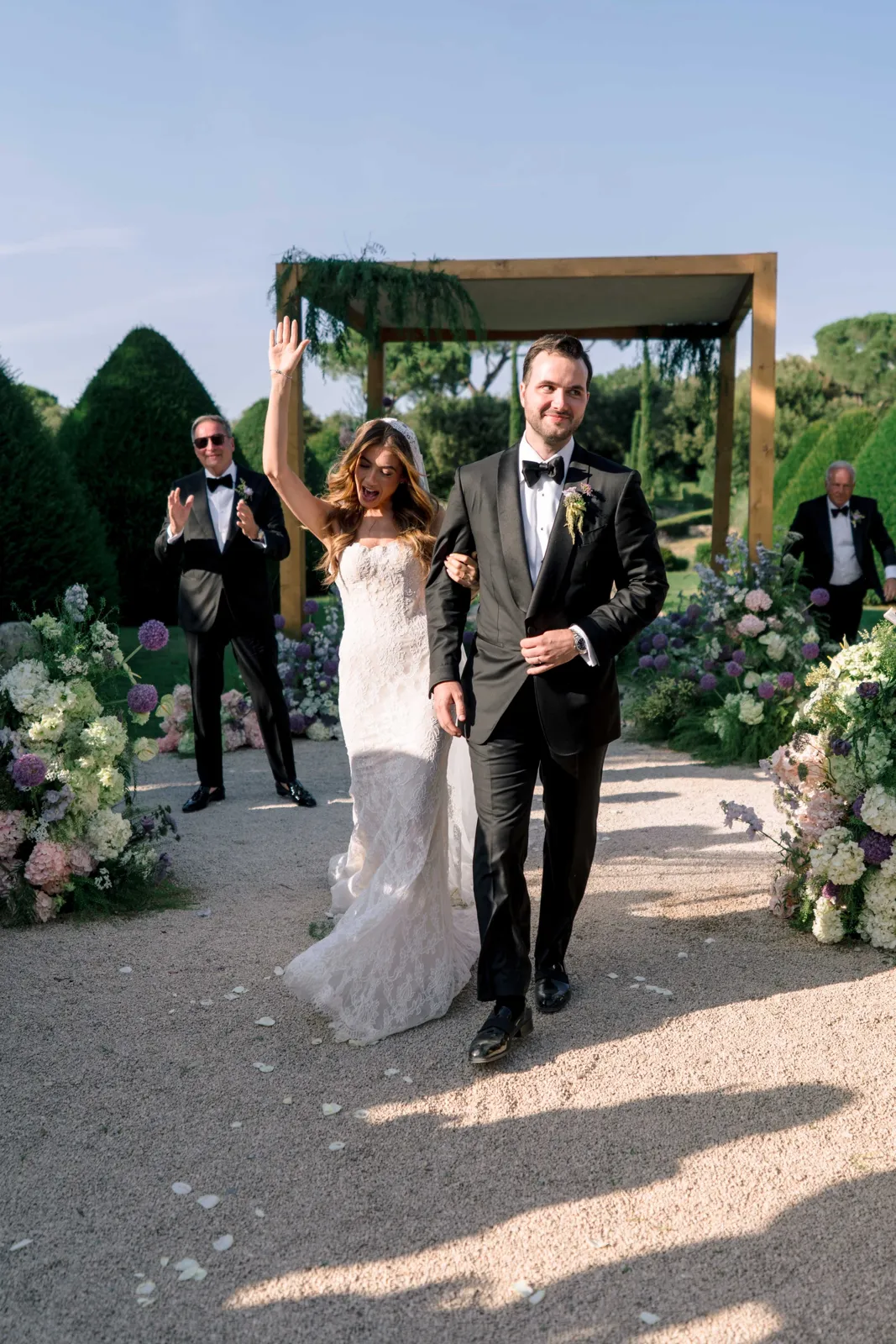 Bride and groom during their outdoor ceremony at Villa Baulieu
