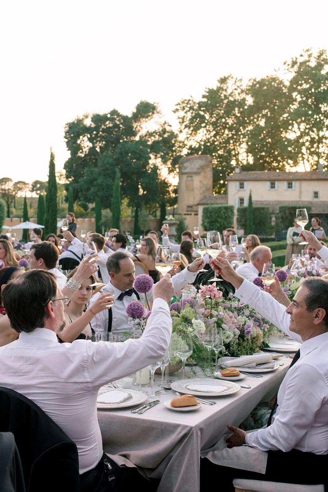 Wedding reception toast at Villa Baulieu in Provence