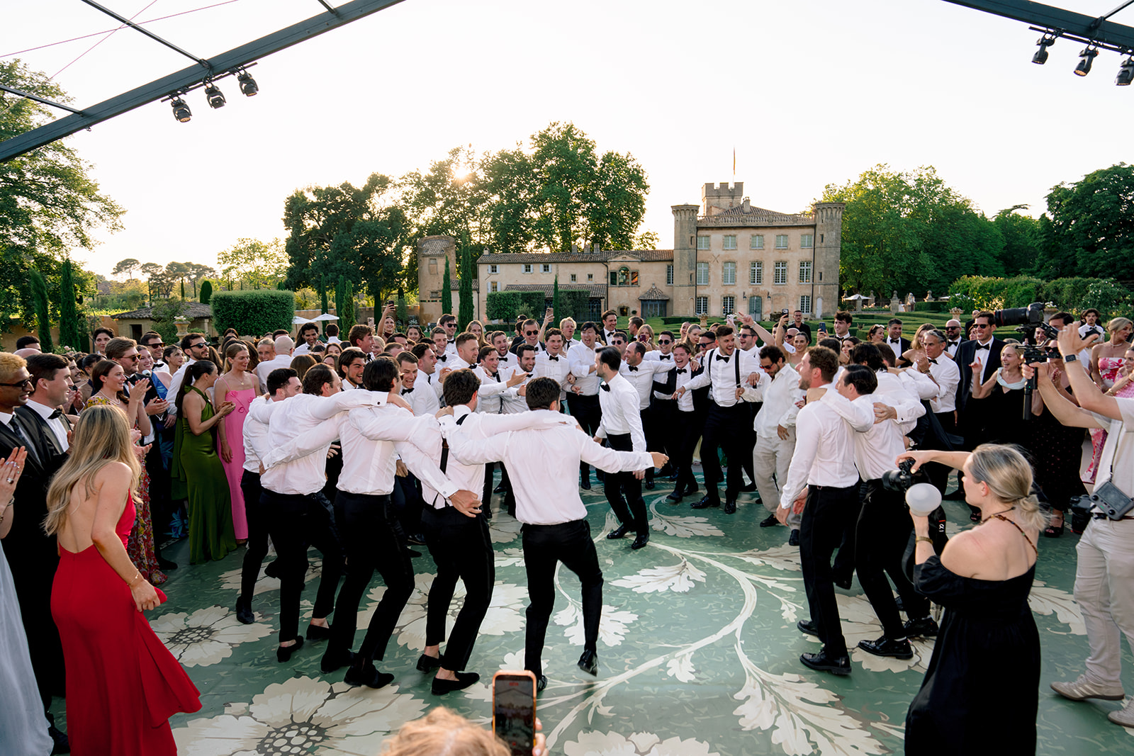 Outdoor dance floor during a wedding reception at Villa Baulieu