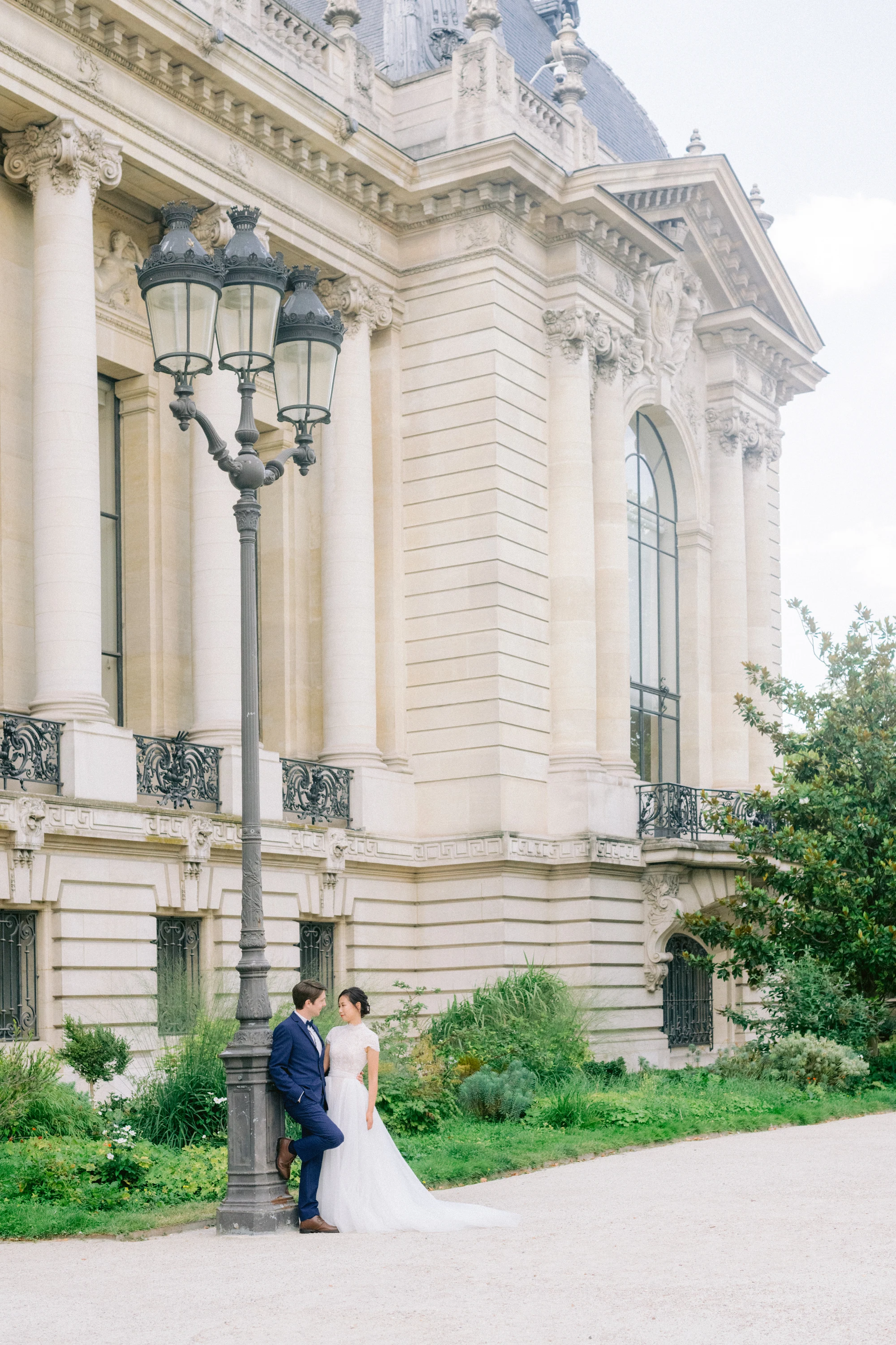 Couple portrait facing Palais Royal in Paris