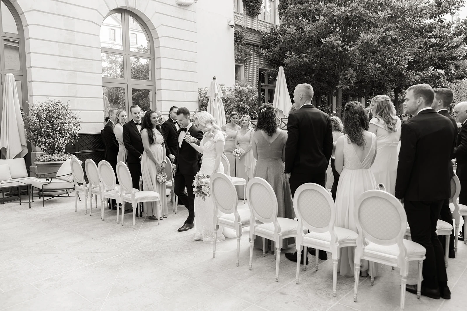 Bride and groom celebrating an elegant wedding at The Ritz Paris in Place Vendôme