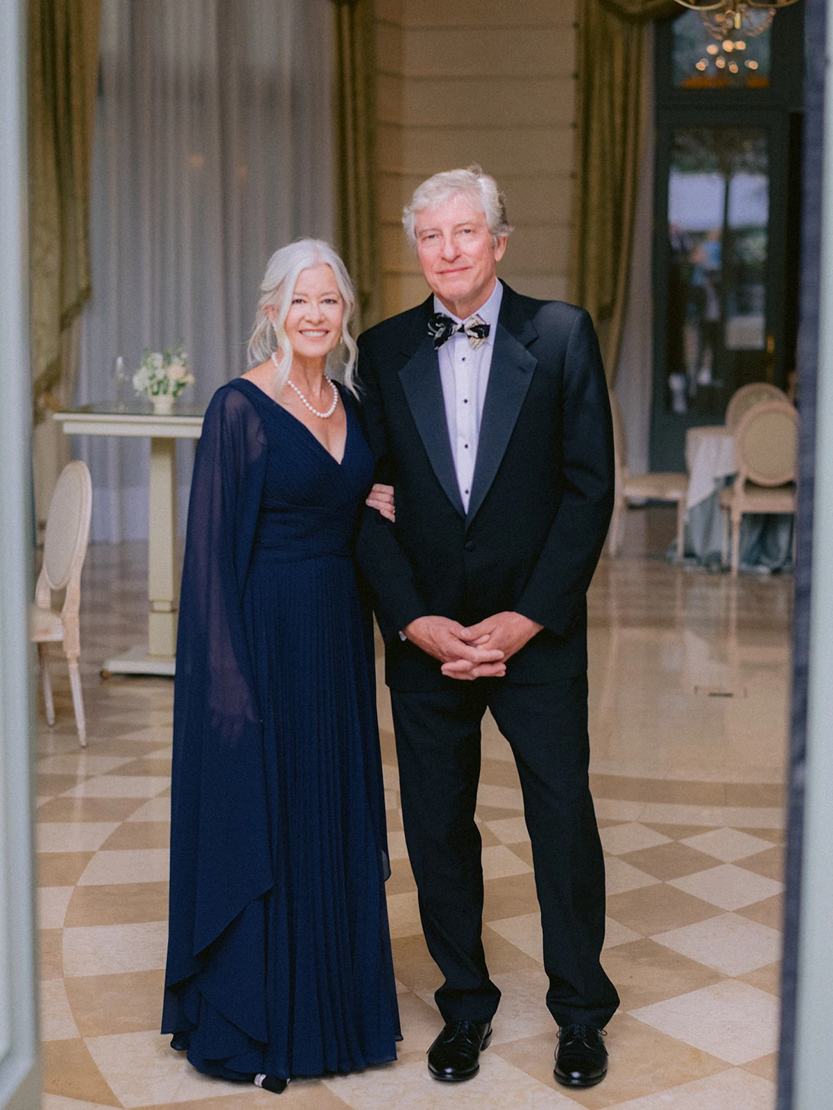 Elegant family portrait in black tie at a luxury Paris wedding