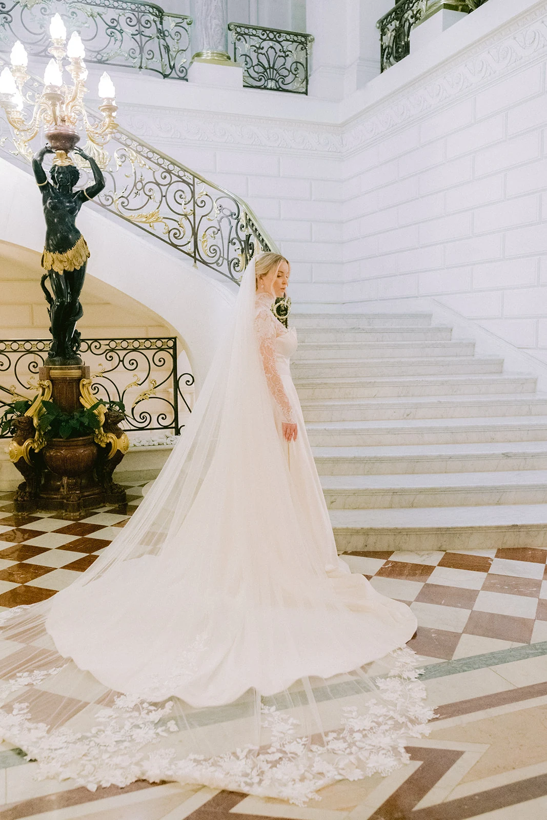 Editorial bridal portrait on the grand staircase at Shangri-La Paris