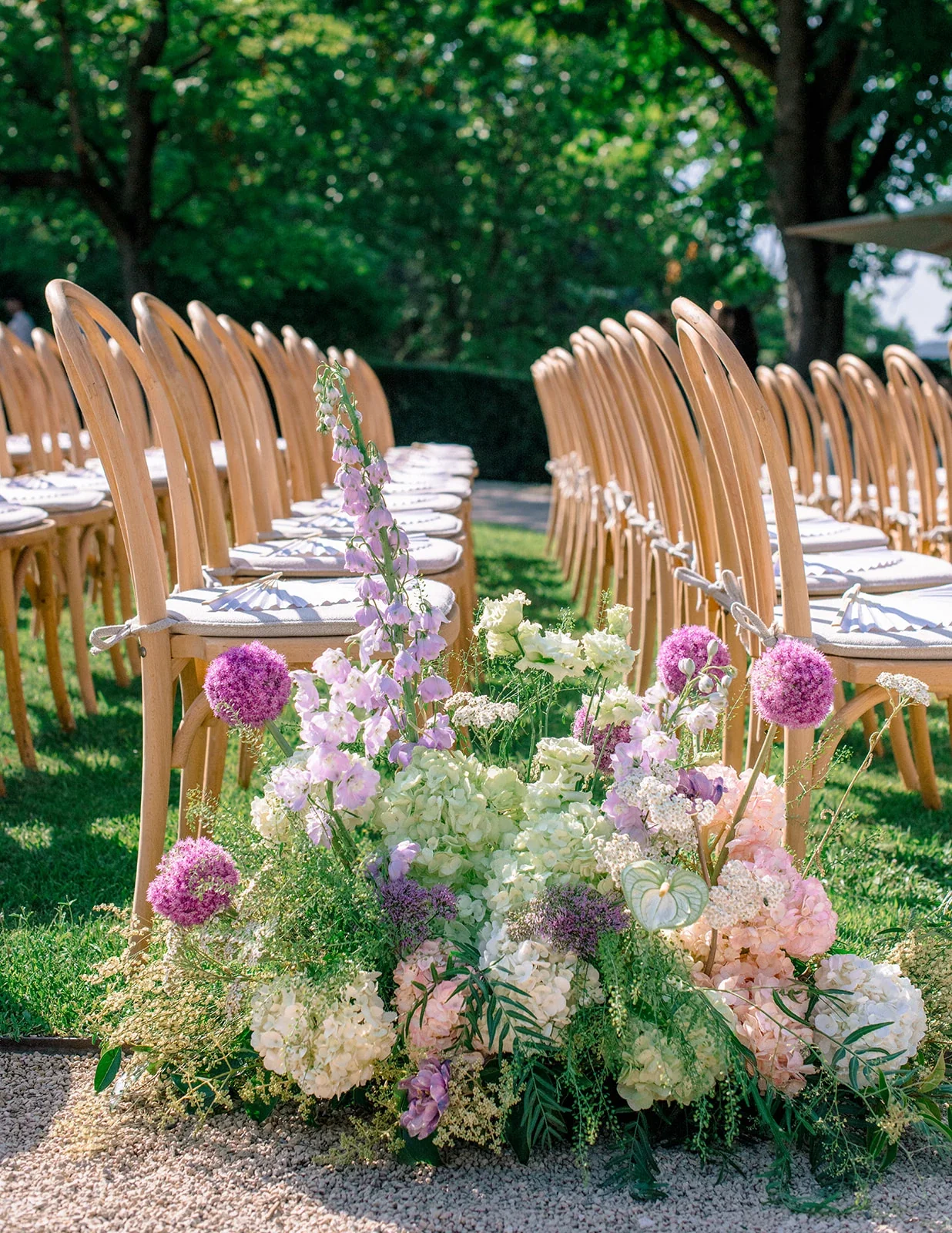 Formal floral wedding ceremony design at Villa Baulieu