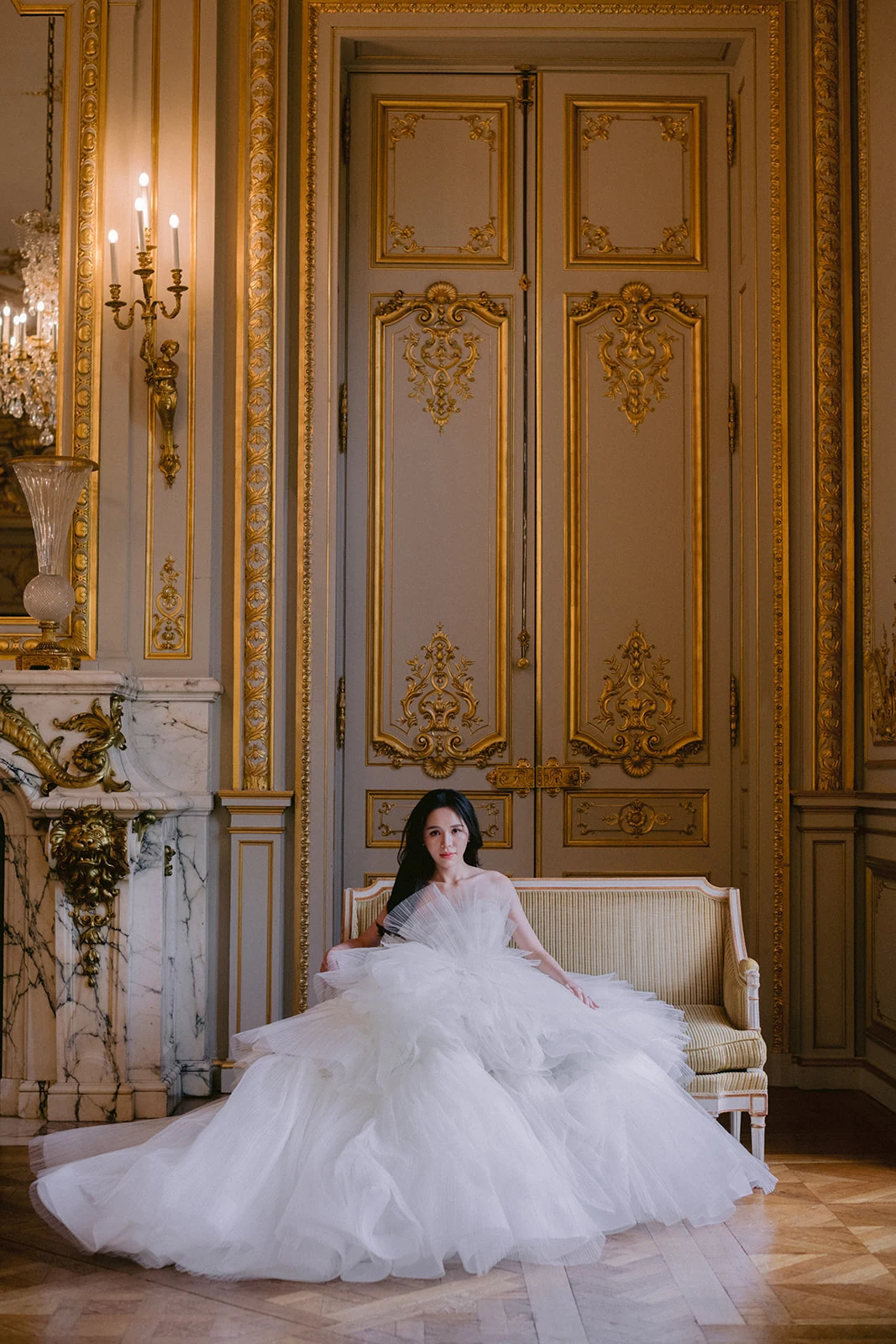 Bride seated in an elegant reception room at Shangri-La Paris