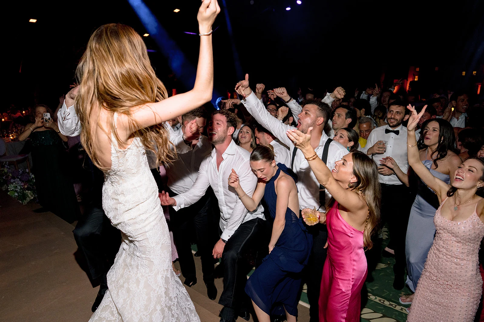 Bride leading the wedding party on the dance floor at Villa Baulieu