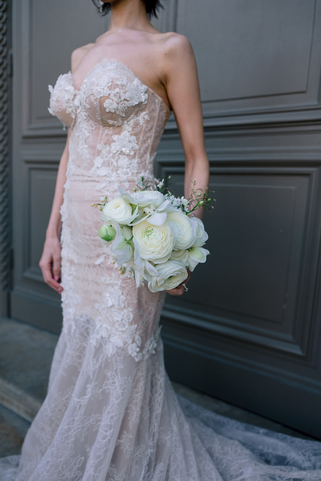 Asian couple in formal wedding attire during a luxury Paris photoshoot