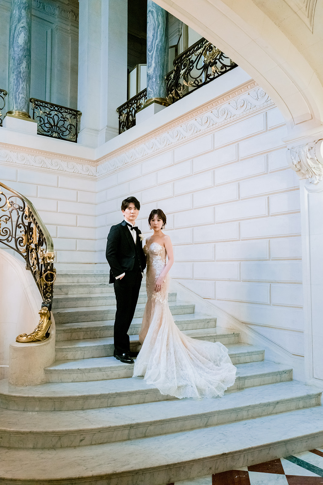 Fine art bridal portrait with lace wedding dress and bouquet in Paris
