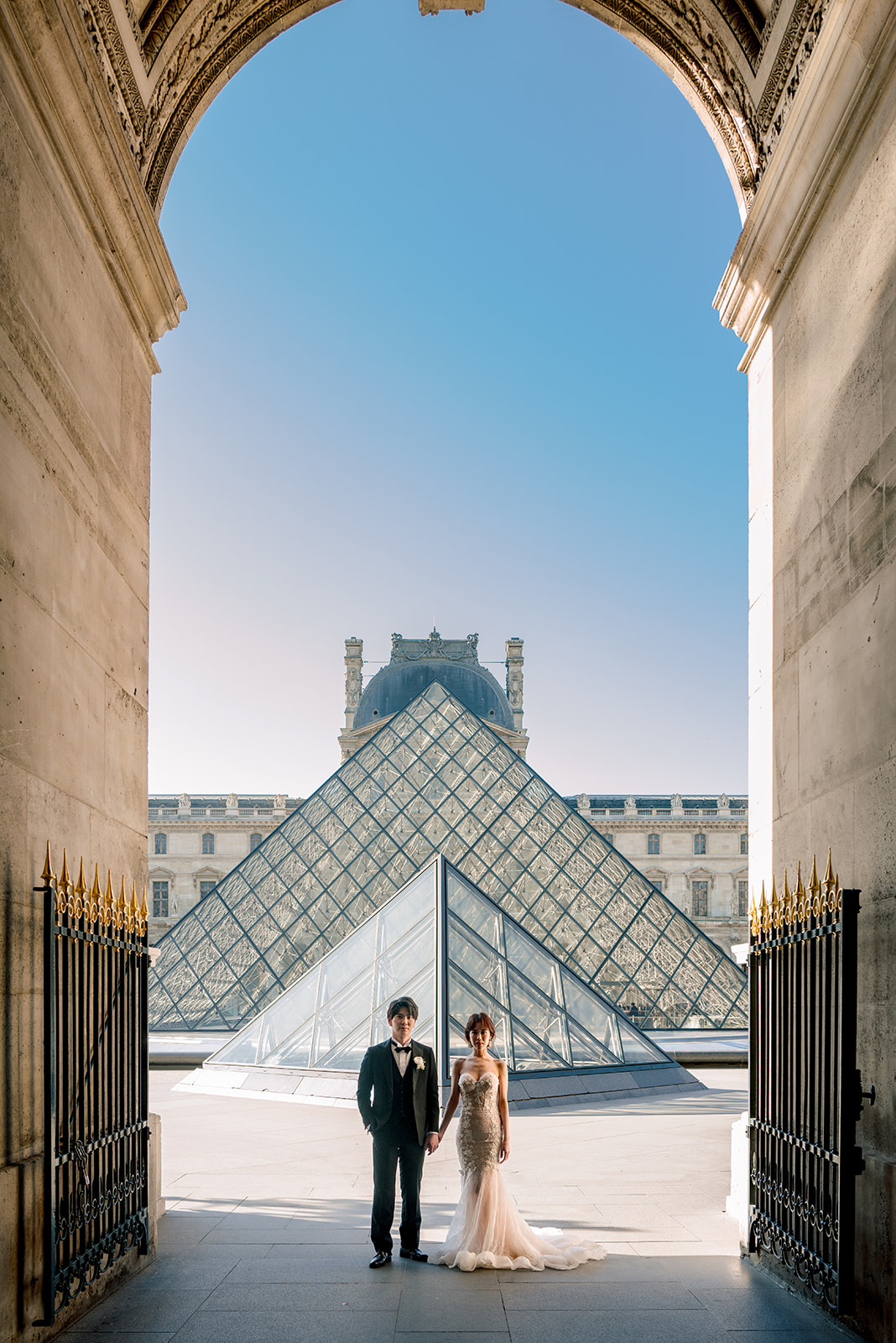 Luxury bridal portrait near the Louvre during a Paris wedding photoshoot